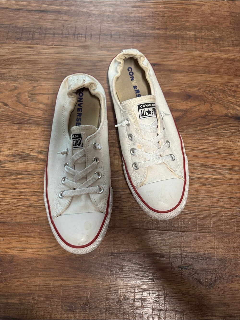 Converse Women’s Low-Top Canvas Sneakers in White with Red Trim